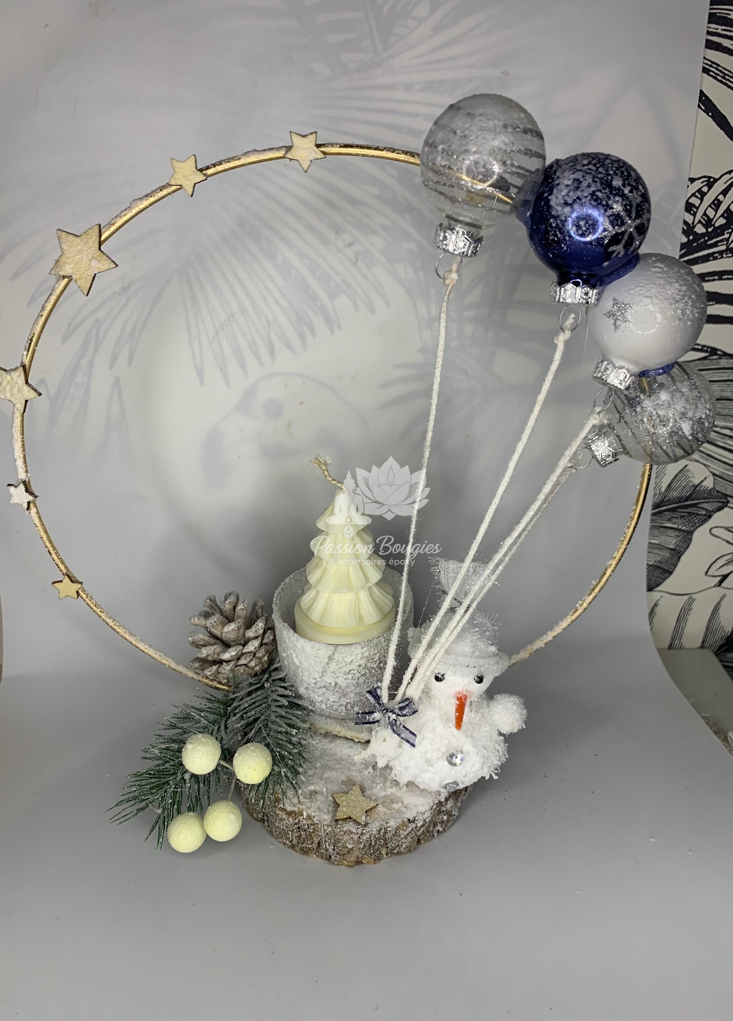 Composition bougie bonhomme de neige ballons